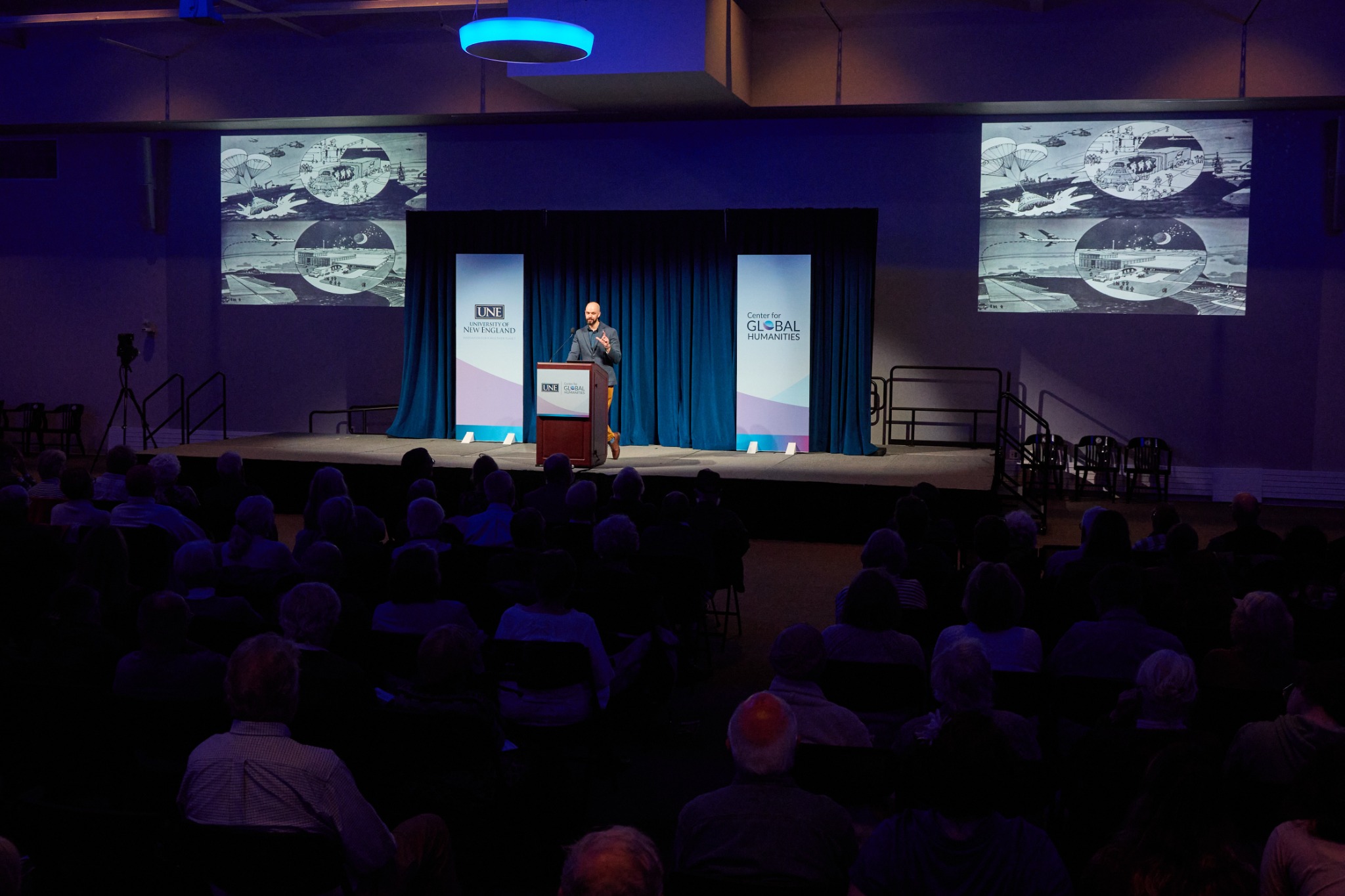 Dagomar Degroot lecturing before a full auditorium